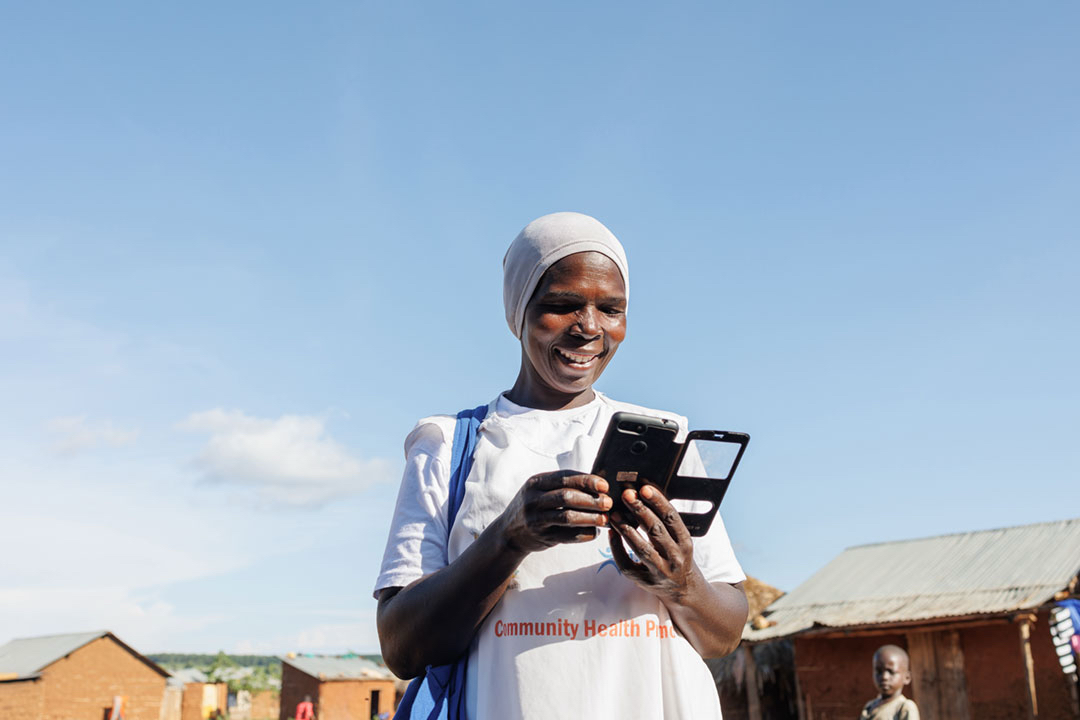 Community Health Worker using VitalSigns in the field